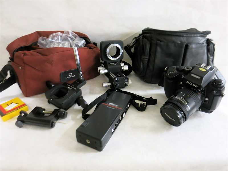 Appraisal: NIKON CAMERA FOUR LENSES AND ACCESSORIES Nikon F with MB-