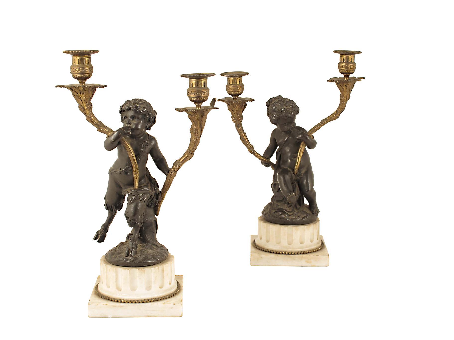 Appraisal: After Clodion A pair of French gilt and patinated bronze