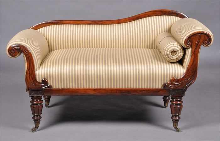 Appraisal: REGENCY CARVED ROSEWOOD RECAMIER With serpentine top rail and roll-over