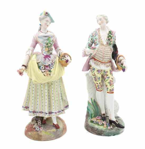 Appraisal: A Pair of Continental Porcelain Figures one depicting a lady