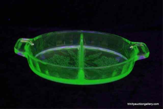 Appraisal: Depression Vaseline Glass Divided Relish DishProduced by Jeannette Glass Company