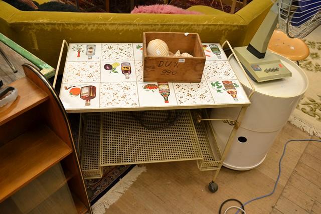 Appraisal: A CREAM DRINKS TROLLEY WITH DRINKS THEMED TILE TOP A