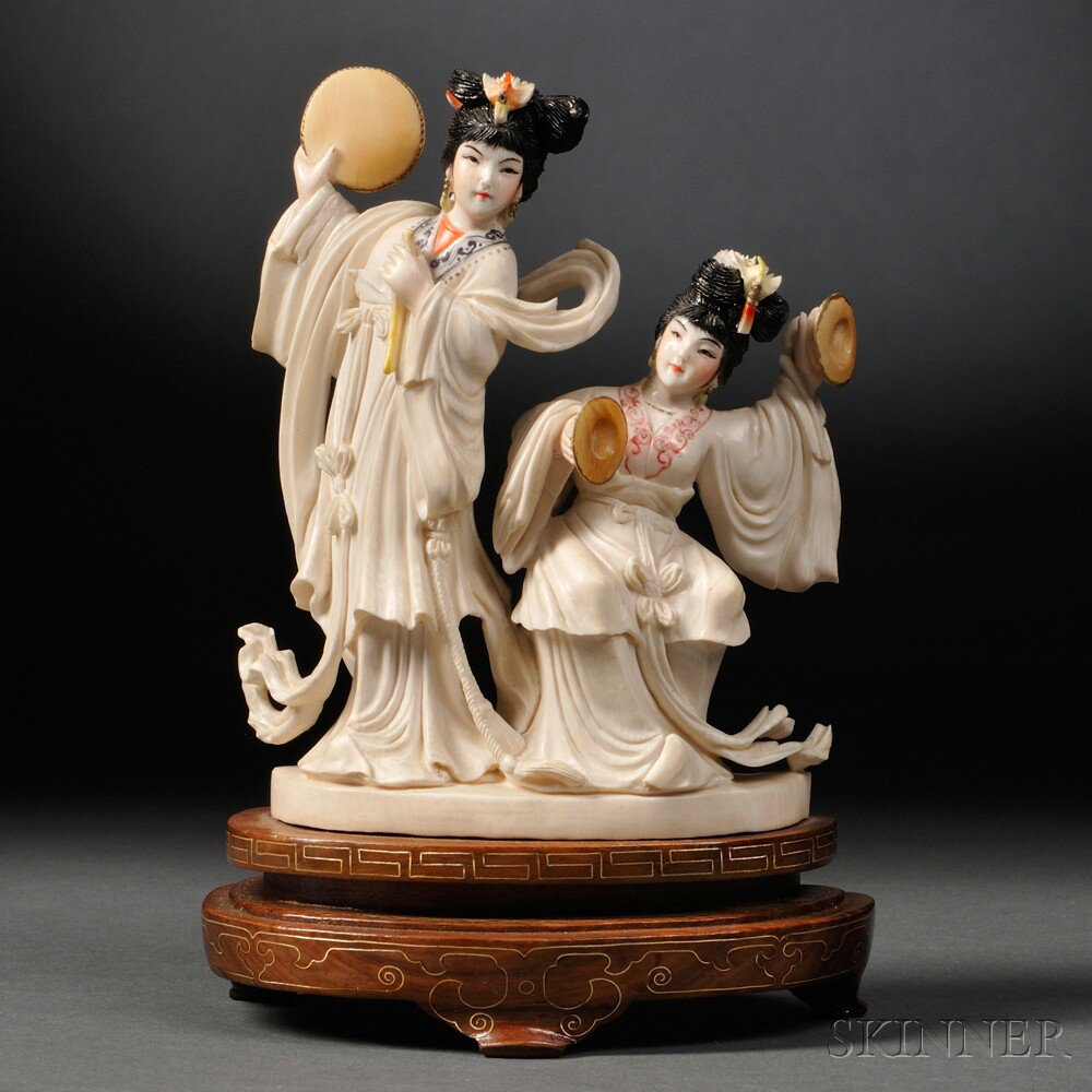 Appraisal: Ivory Carving of Musicians China depicting two ladies playing musical