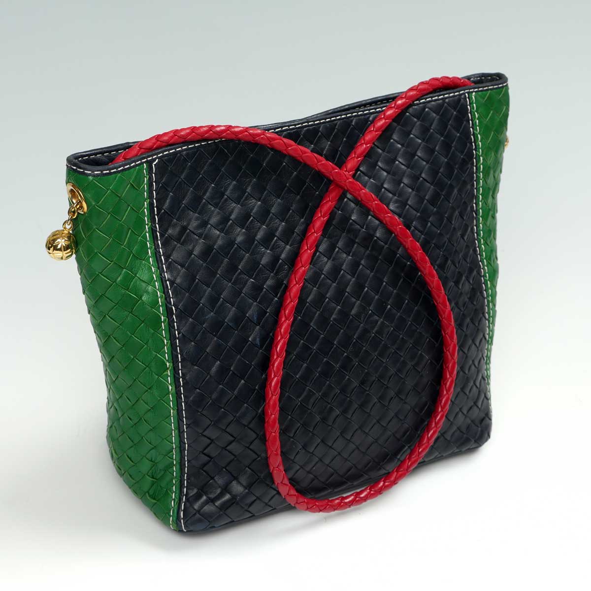 Appraisal: MULTI-COLORED ITALIAN BOTTEGA WOVEN HANDBAG Italian made shoulder bag is