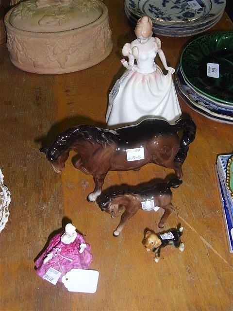 Appraisal: A BESWICK HORSE a foal a pottery dog a Royal