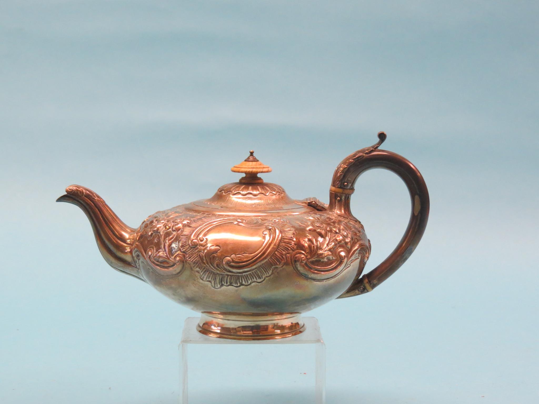 Appraisal: A William IV silver teapot squat form embossed with flowers