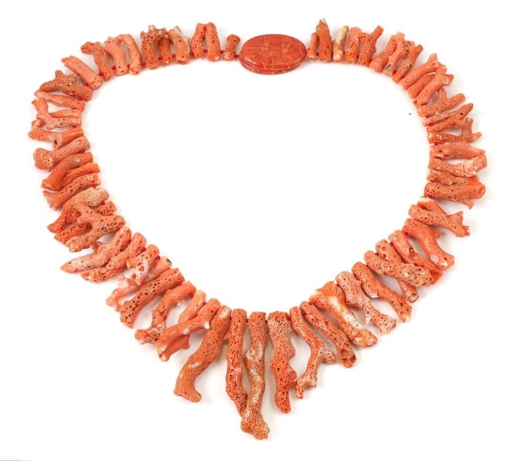 Appraisal: pink branch coral necklace with oval disk Longest branch is