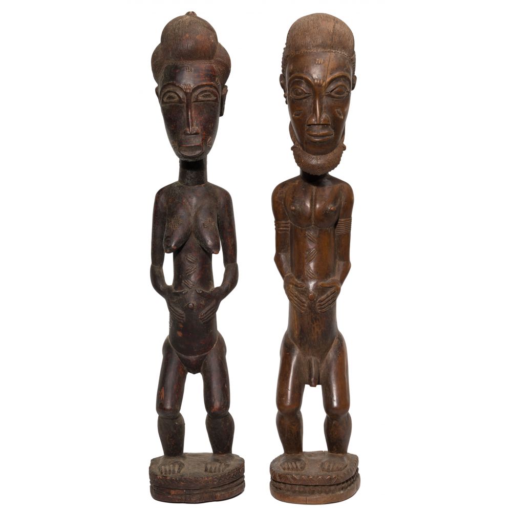 Appraisal: AFRICAN BAULE CARVED WOOD SCULPTURES items including a male and