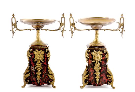 Appraisal: Pair French ormolu-mounted ebonized wood cassolettes circa ornate tazzas supported