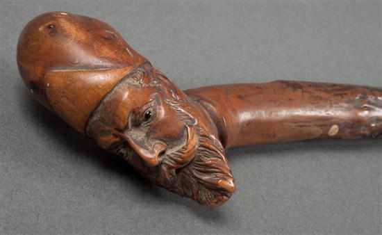 Appraisal: German Black Forest hardwood figure head walking stick with inset