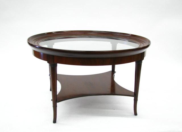 Appraisal: Kittinger Round Cocktail Table with Glass Top and low shelf