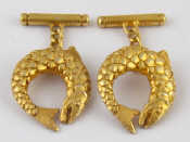 Appraisal: A pair of hallmarked silver gilt cufflinks designed as fish