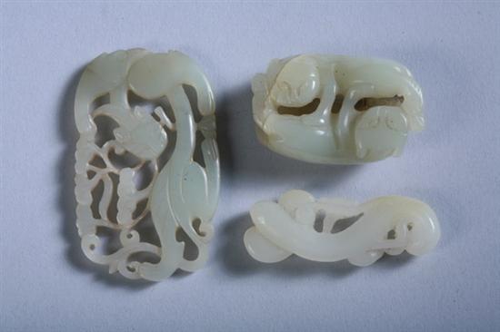 Appraisal: THREE CHINESE CELADON JADE CARVINGS Carved to depict ruyi scepter