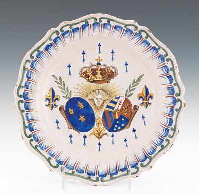 Appraisal: A Malicorne Faience Armorial Plate Shaped faience plate hand decorated