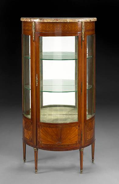 Appraisal: A Louis XVI style gilt bronze mounted inlaid mahogany vitrine