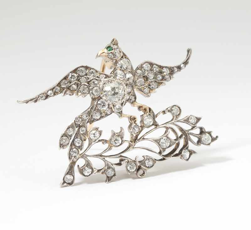 Appraisal: A Victorian old mine-cut diamond and silver-topped gold bird brooch