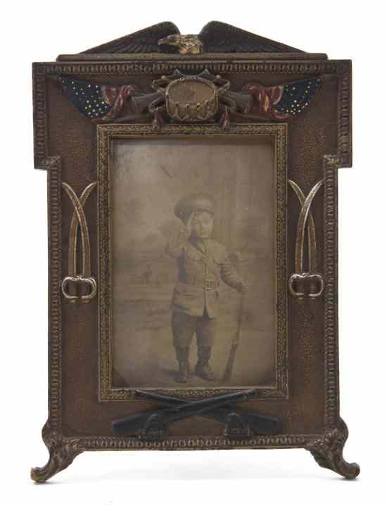 Appraisal: A Cast Iron Picture Frame Judd Co decorated in a