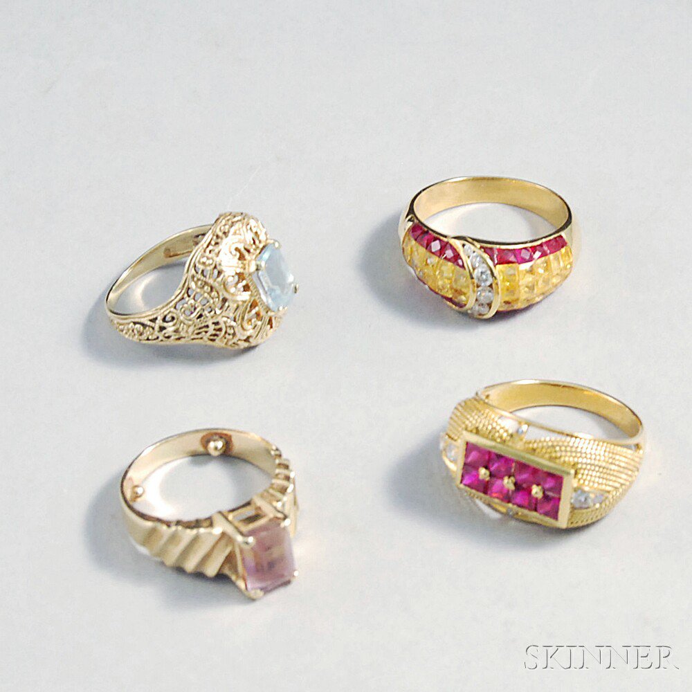 Appraisal: Four Gold and Gem-set Rings a kt with filigree and