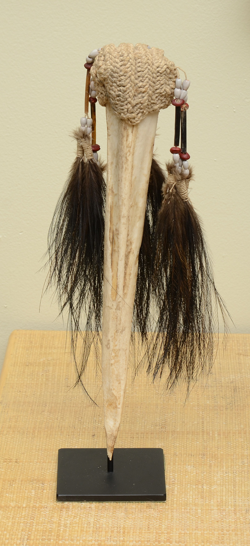 Appraisal: Tribal Rope and Feather-Mounted Cassowary Bird Leg Bone On a