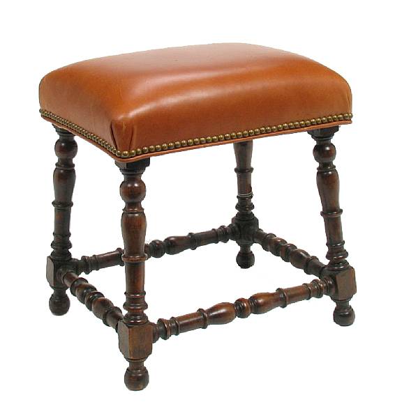 Appraisal: A leather upholstered and turned walnut stool height in width