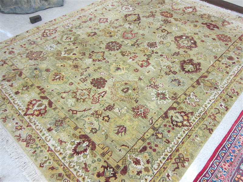 Appraisal: HAND KNOTTED ORIENTAL CARPET Indo-Persian overall stylized floral design on