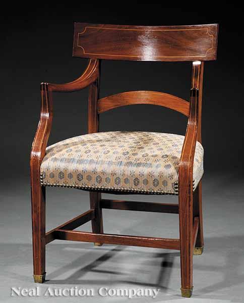 Appraisal: A Regency-Style Mahogany Armchair th c shaped rectangular crest rail