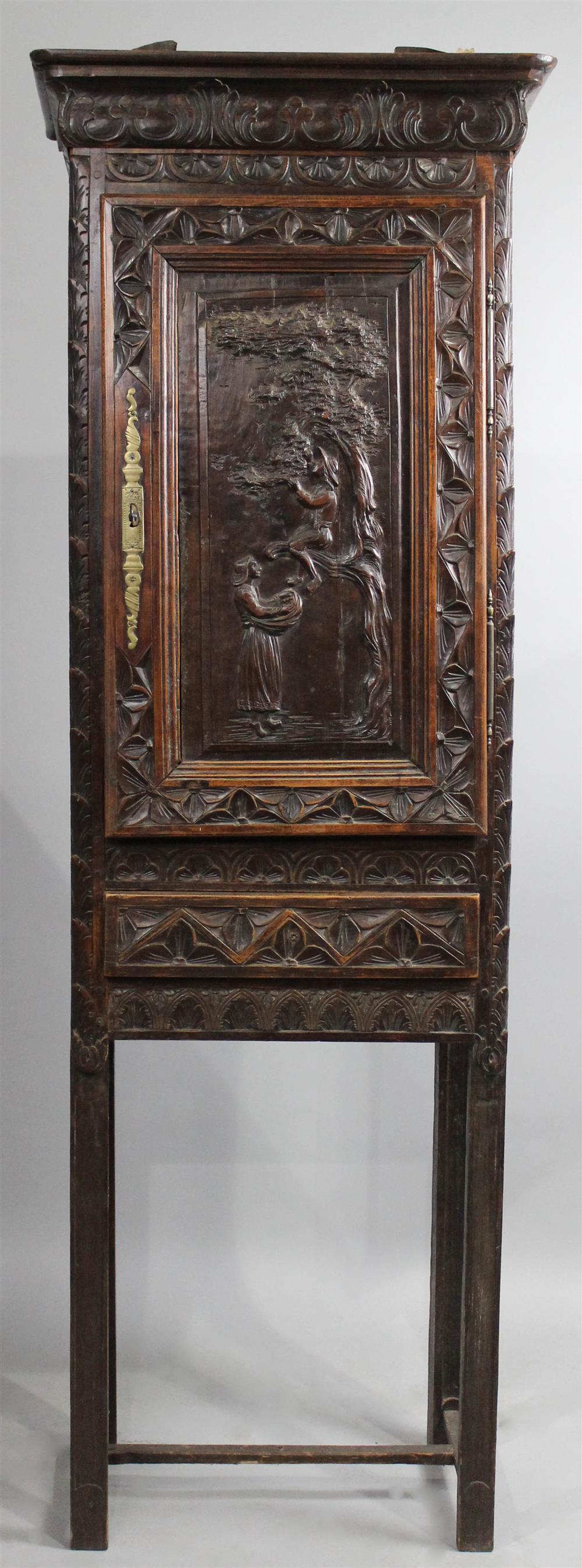 Appraisal: PROVINCIAL CARVED OAK BONNETIERE having a carved and molded cornice