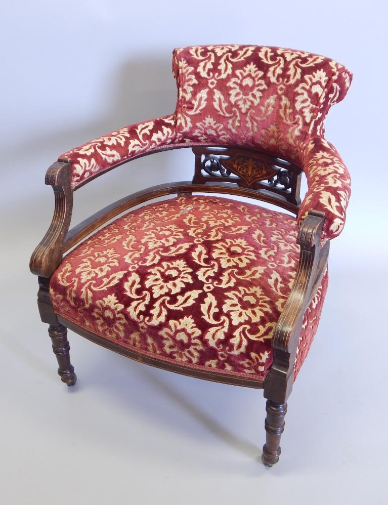 Appraisal: A late thC early thC rosewood tub chair with a