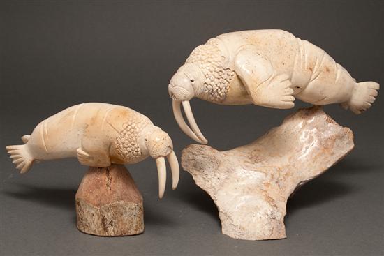 Appraisal: Two Inuit carved bone figures of swimming walruses each mounted