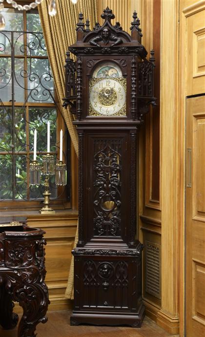 Appraisal: Highly carved mahogany grandfather tall case clocklate th century