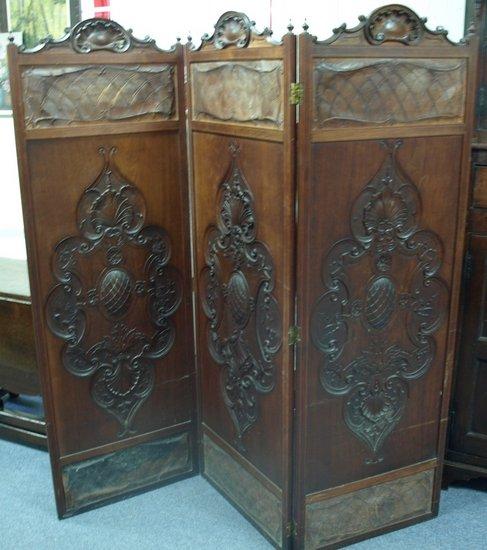 Appraisal: An Edwardian three-fold screen the carved crest to each fold