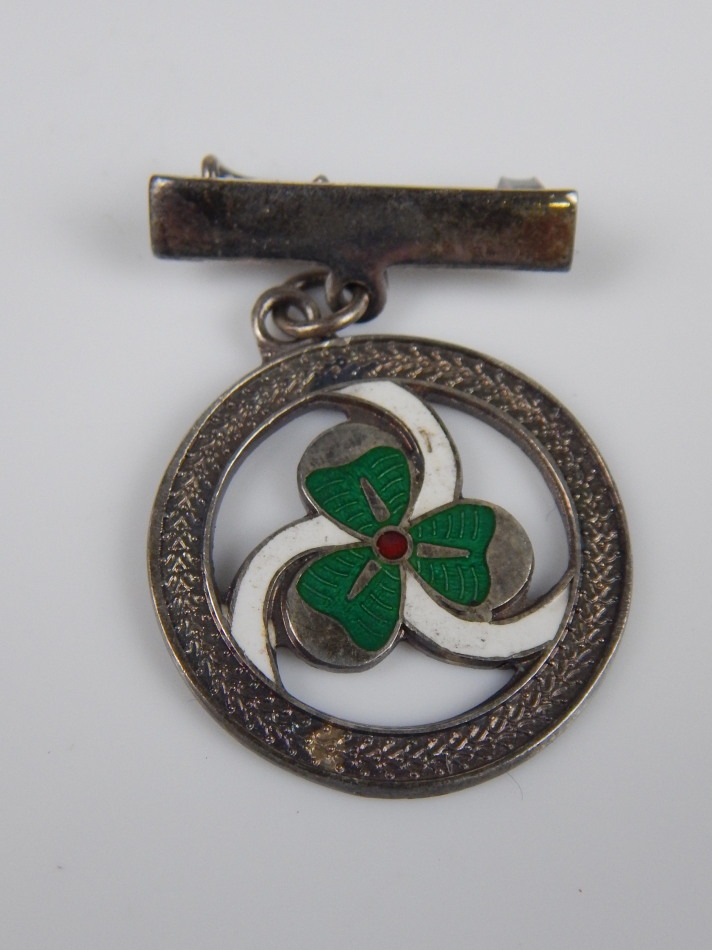 Appraisal: An Irish silver bar brooch the circular drop with three