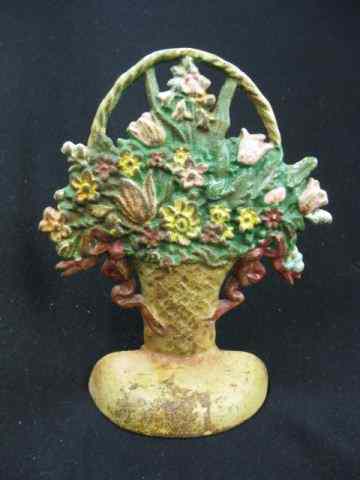 Appraisal: Cast Iron Figural Doorstop basket of flowers ''