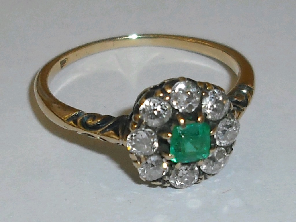 Appraisal: Attractive ct emerald and diamond cluster ring with a princess