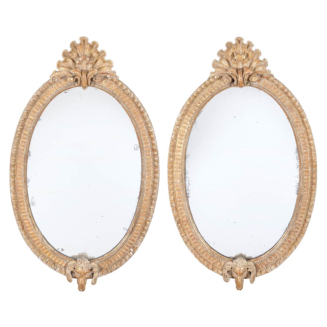 Appraisal: Pair of George III Style Giltwood Pier Mirrors Each oval