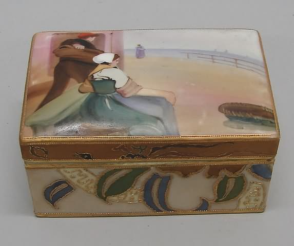 Appraisal: Featuring figures on lid and floral design on base of