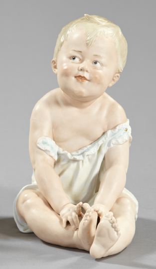 Appraisal: German Polychromed Biscuit Porcelain Figure of a Baby first quarter