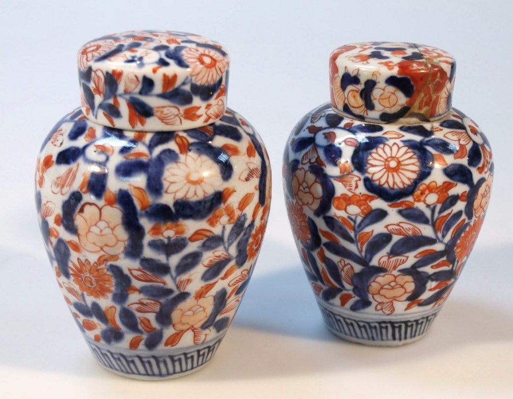 Appraisal: A pair of thC Imari decorated vases each shouldered body