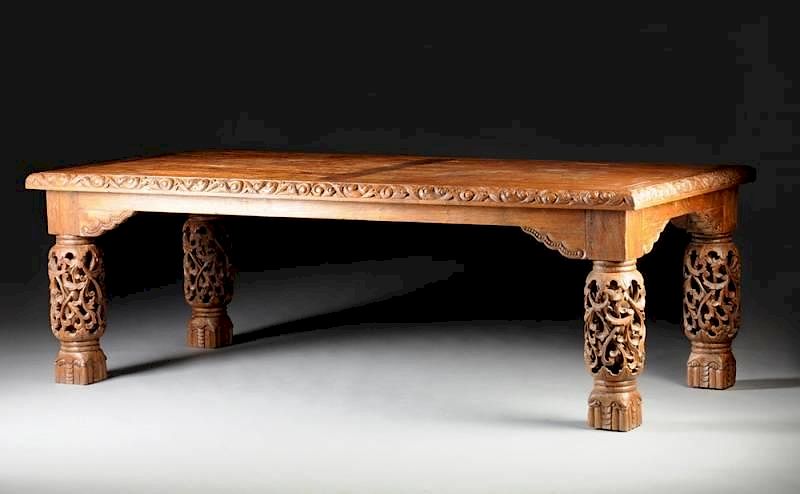 Appraisal: A SPANISH COLONIAL STYLE CARVED OAK DINING TABLE A SPANISH