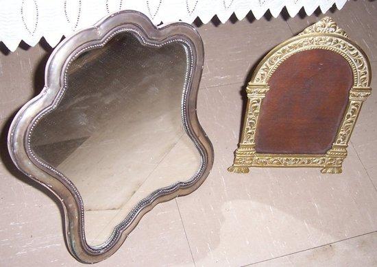 Appraisal: A white metal easel mirror of cartouche form cm x