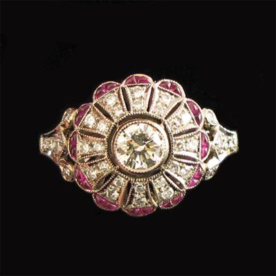 Appraisal: A diamond and ruby cluster ring the centre circular cut