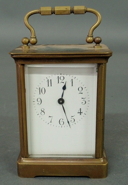 Appraisal: French brass carriage clock with beveled glass h x w