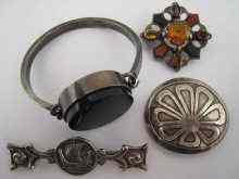 Appraisal: A mixed lot comprising a Scottish stone set brooch with