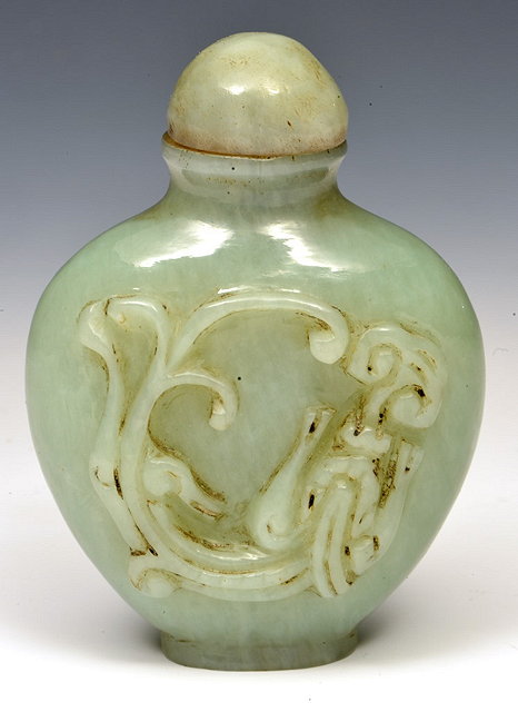 Appraisal: A CHINESE JADE CARVED SNUFF BOTTLE and stopper th Century