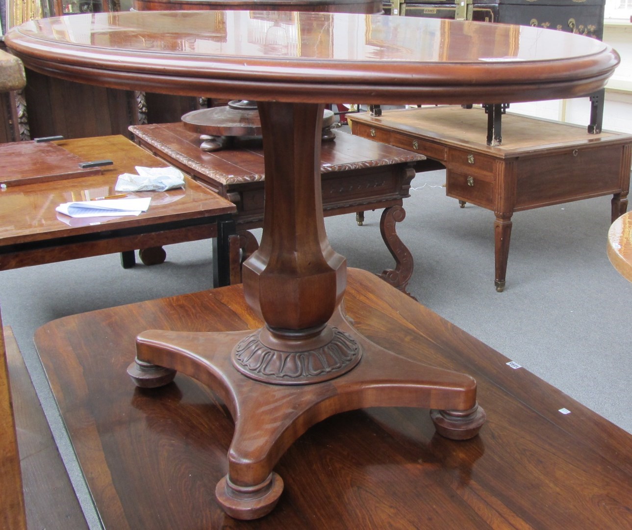 Appraisal: A William IV mahogany oval pedestal table on an octagonal