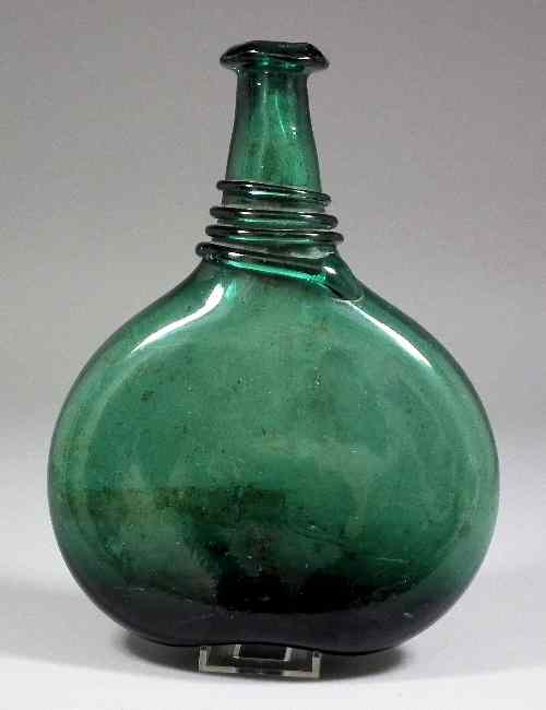 Appraisal: A th Century near Eastern green tinted glass flask with