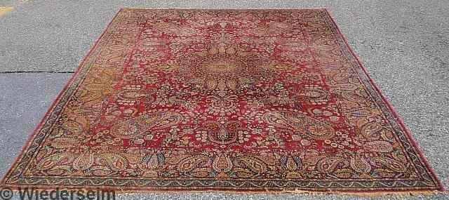 Appraisal: Room size Kerman oriental carpet red field and overall floral