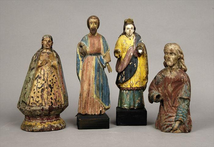 Appraisal: Four Polychrome Carved Wood Santos Figures to in