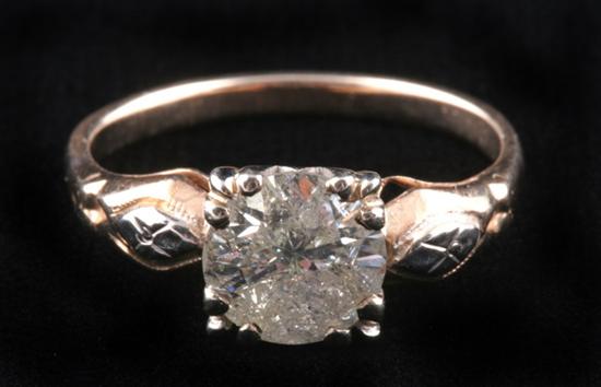 Appraisal: YELLOW GOLD AND DIAMOND RING Brilliant-cut round diamond weighing approx