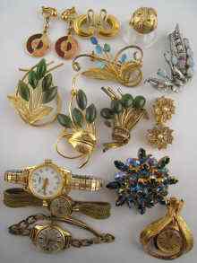 Appraisal: A quantity of costume jewellery and watches and a white